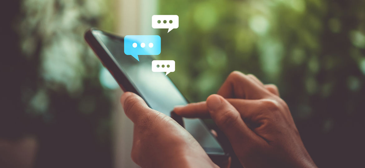 Women hand using smartphone typing, chatting conversation in cha